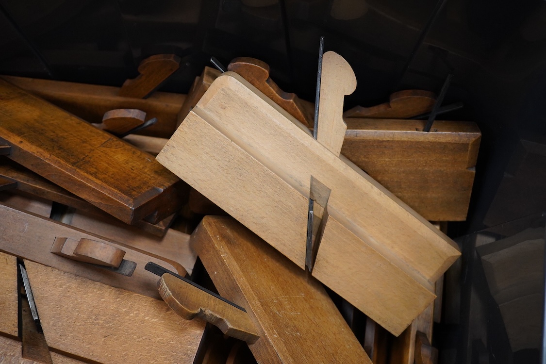 Fifty early 20th century woodworking moulding planes, etc. by John Moseley & Son, London, A.Mathieson & Son, Glasgow, Buck, Tottenham Court Road, Preston, Christopher Johnson & Co., Malloch & Son, Perth, most with the bo